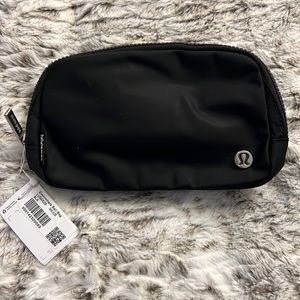 NEW Lululemon Black Everywhere Belt Bag Water-Repellent. Zippered pockets.